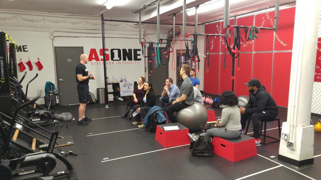 mark merchant speaks at as one fitness